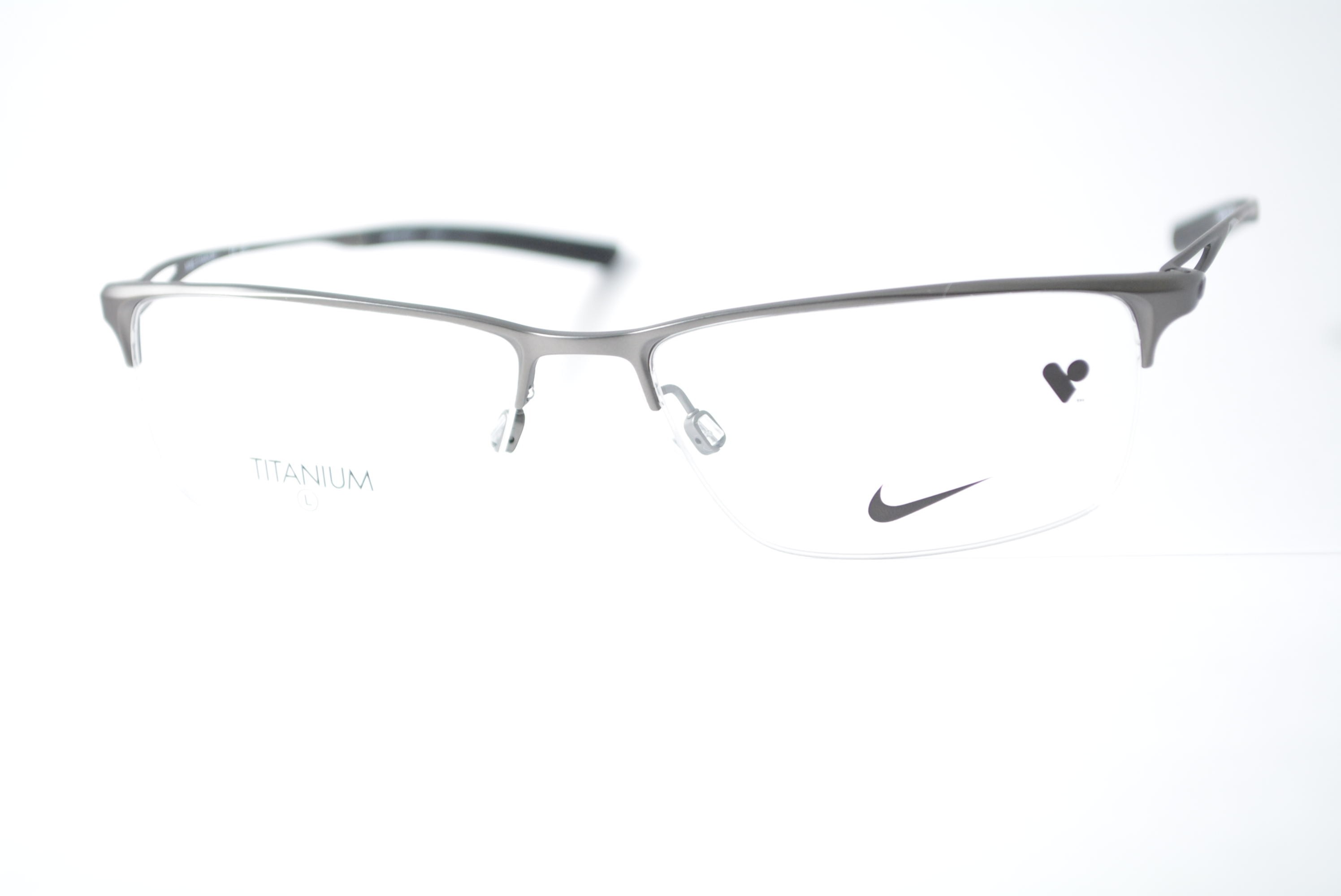 armação de óculos Nike mod 6064 070 titanium